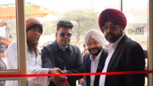 Ribbon cutting ceremony at VMT Motors Tata Hitachi Dealer in Faridabad.